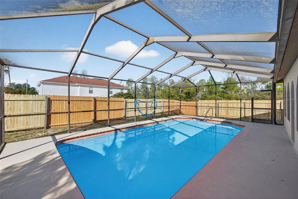 12435 Lola Drive Spring Hill, FL 34608 - Photo 52 of 63 a view of a backyard