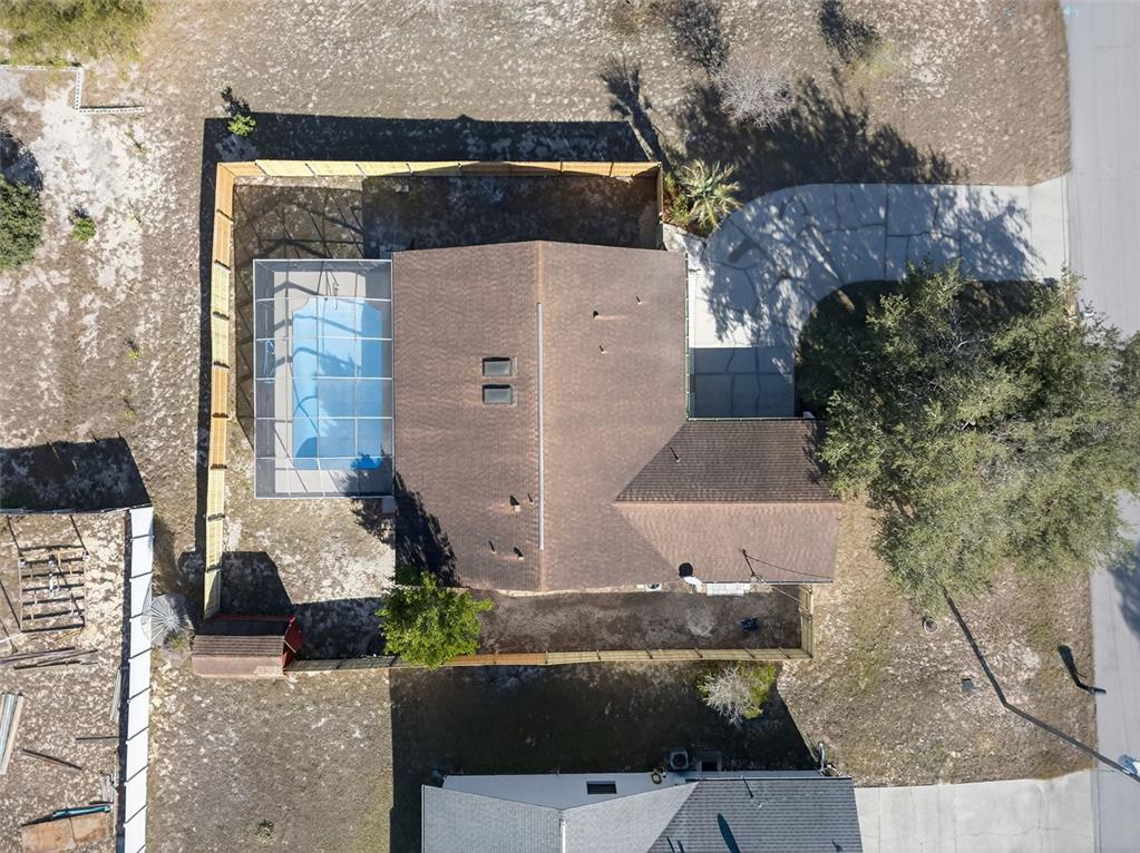 12435 Lola Drive Spring Hill, FL 34608 - Photo 55 of 63 an aerial view of a house with a yard