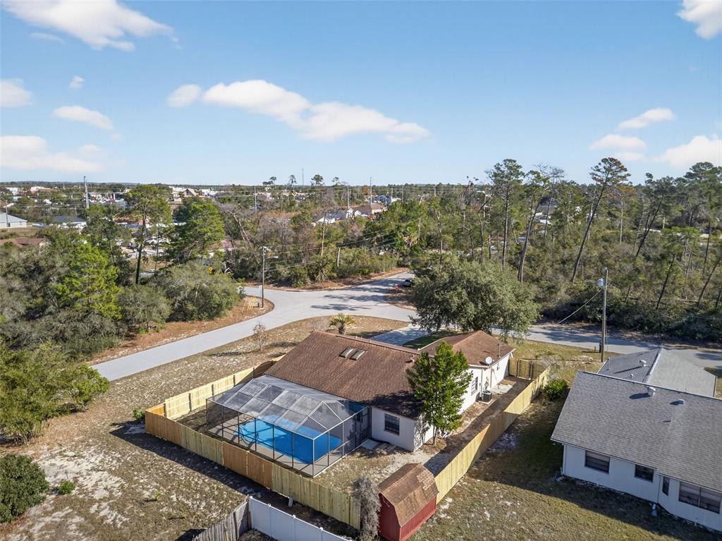 12435 Lola Drive Spring Hill, FL 34608 - Photo 63 of 63 a view of a terrace with lawn chairs