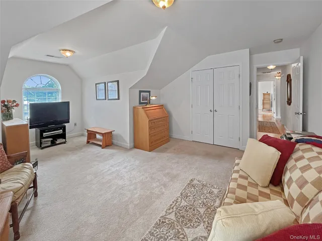 a bedroom with furniture and a bed