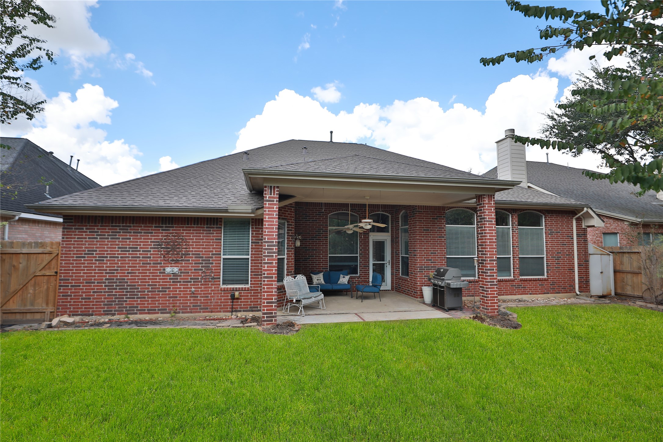 6611 Knollbridge Lane Spring, TX 77379 - Photo 28 of 40 a view of a house with porch and garden