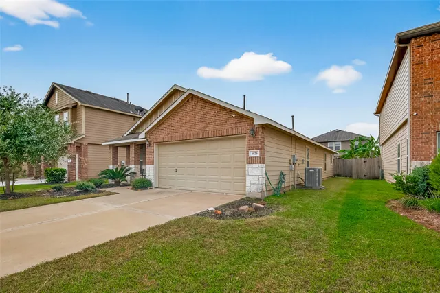 a view of a backyard of the house