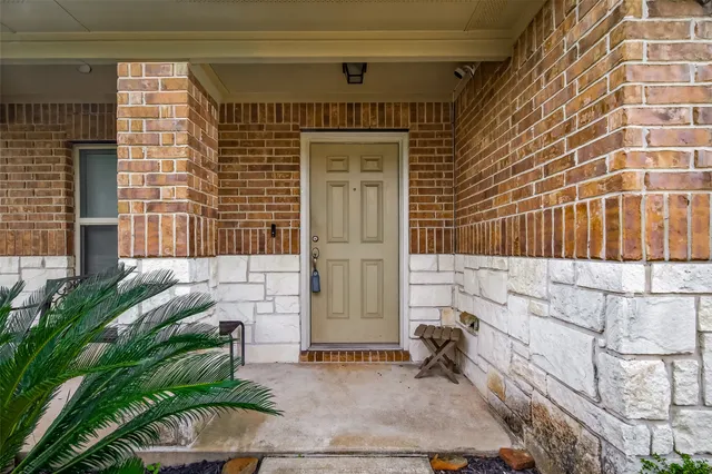 a view of entrance gate of a house