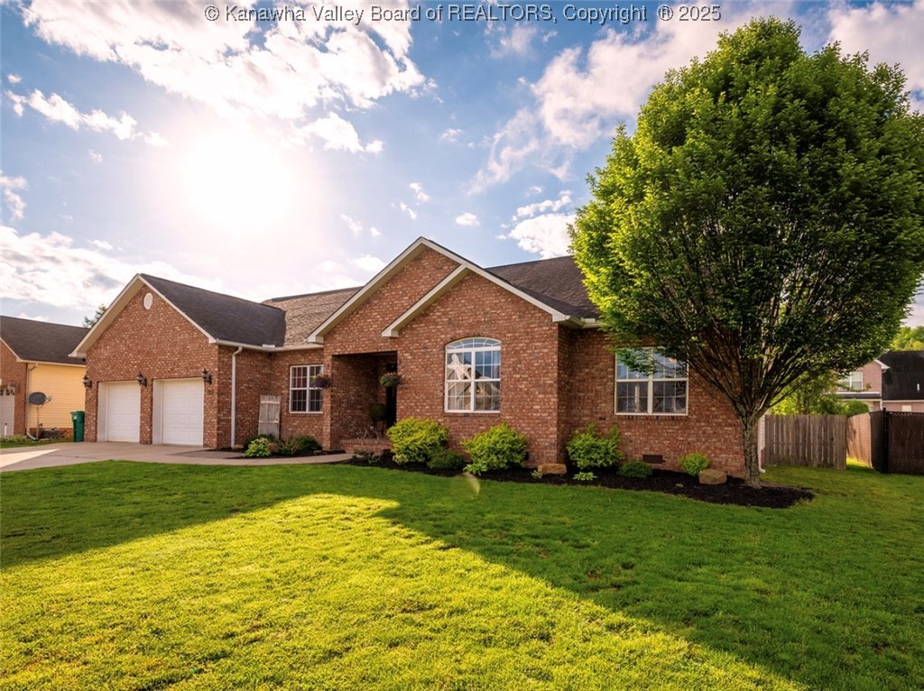 123 Baker Drive Winfield, WV 25213 - Photo 2 of 25 2 car attached garage & brick exterior