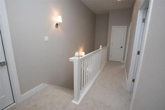 a view of a hallway and stairs