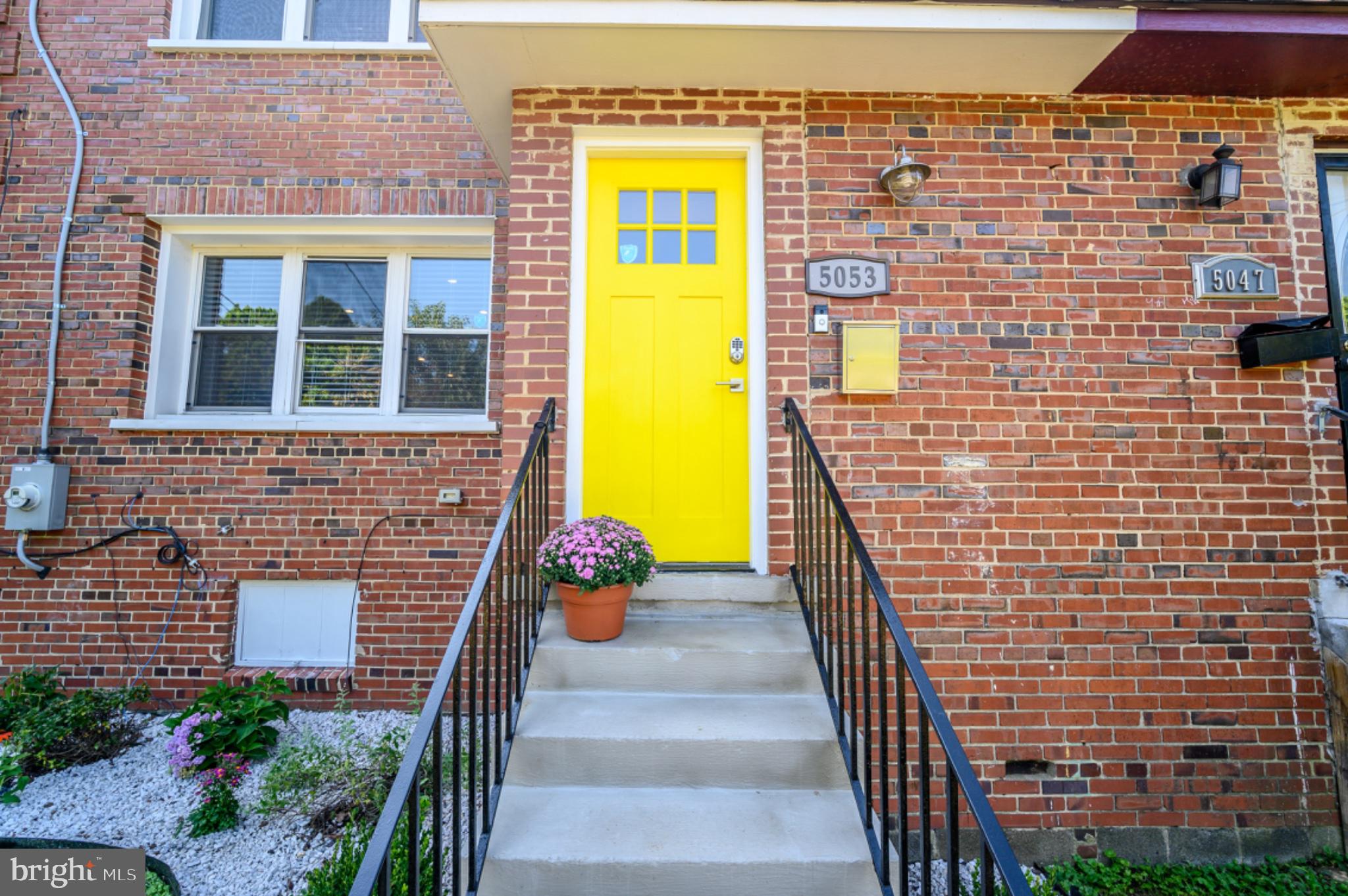 Charming entrance with a sunny door.