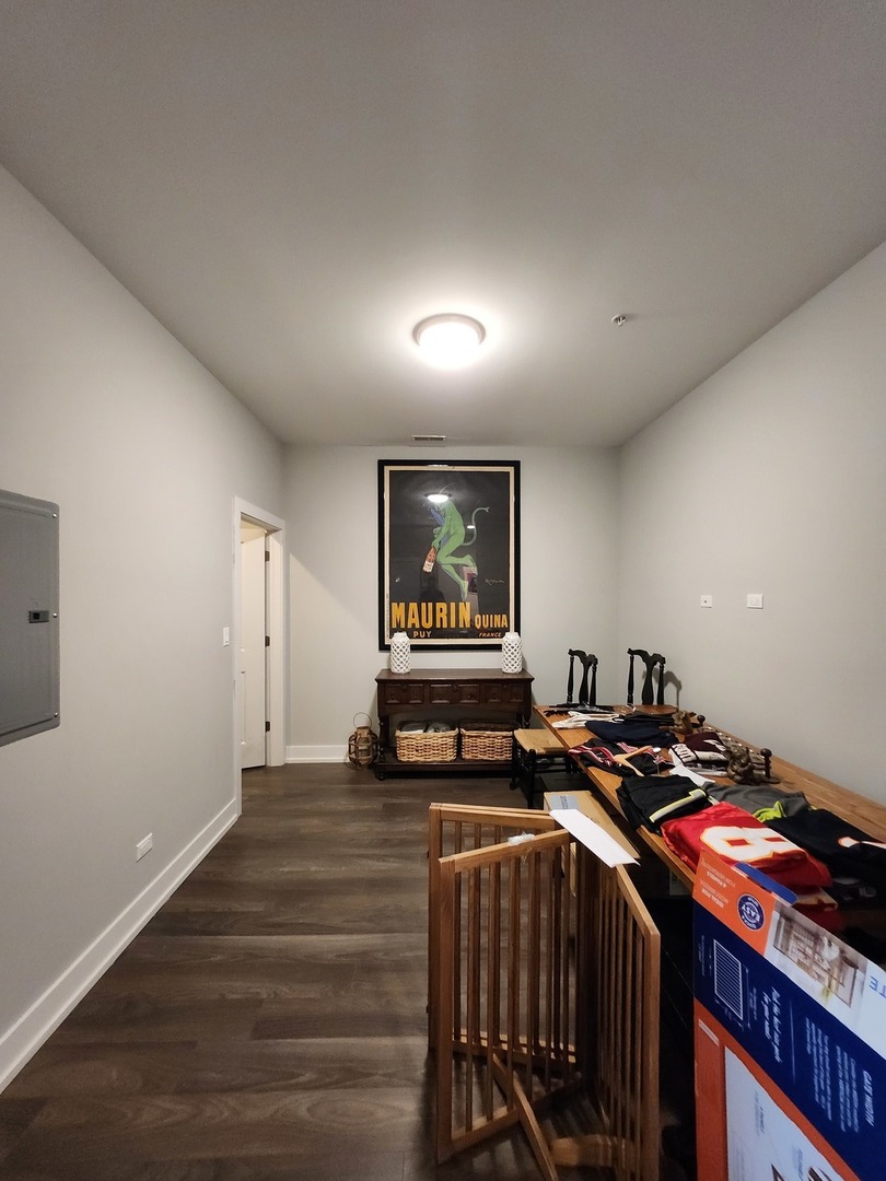 1202 Waukegan Road, Unit 209 Glenview, IL 60025 - Photo 18 of 22 a very nice looking room with wooden floor