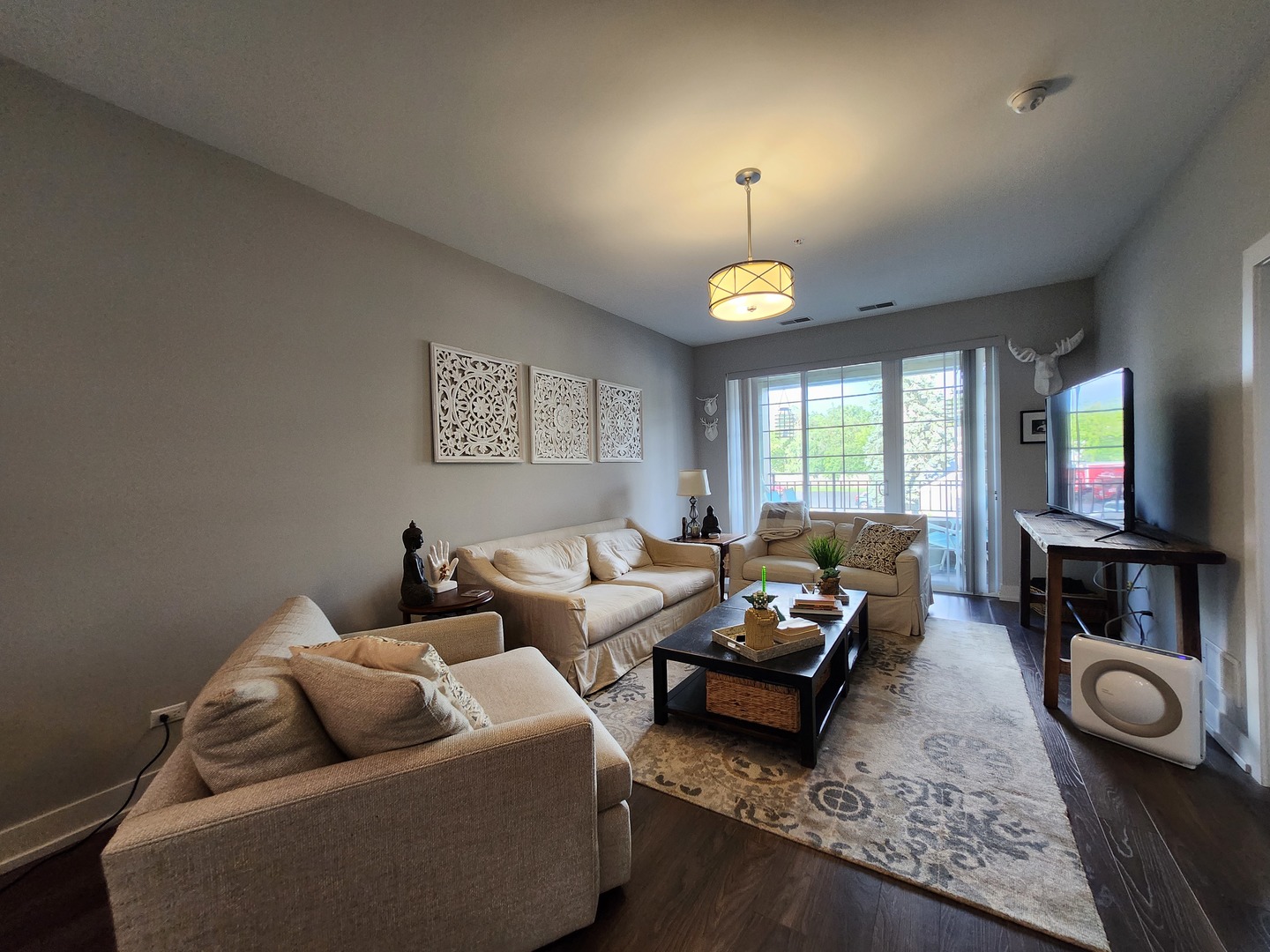 1202 Waukegan Road, Unit 209 Glenview, IL 60025 - Photo 6 of 22 a living room with furniture and a fireplace