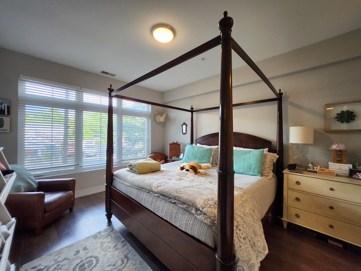 1202 Waukegan Road, Unit 209 Glenview, IL 60025 - Photo 8 of 22 a bed room with furniture and a window