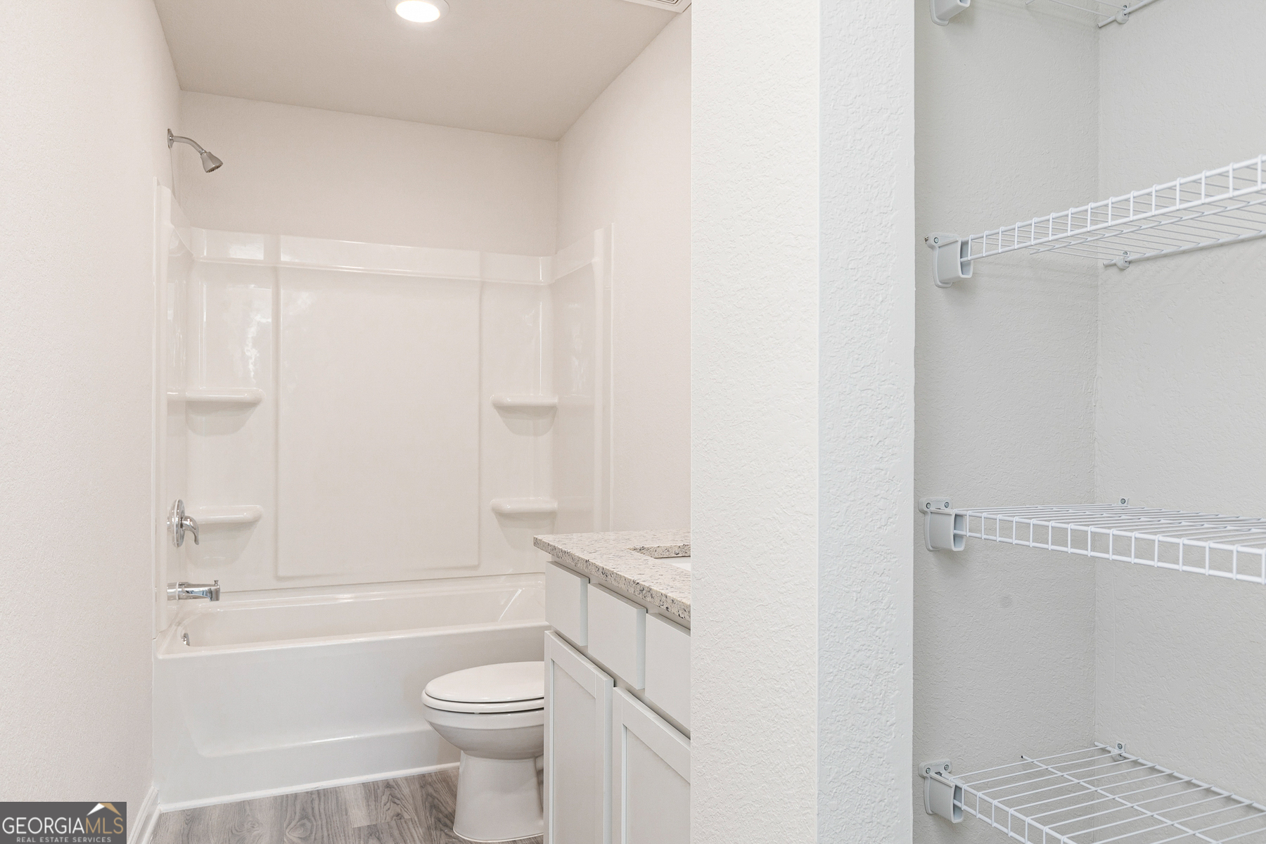 514 Plant Road Conyers, GA 30013 - Photo 12 of 18 a bathroom with a toilet and a shower