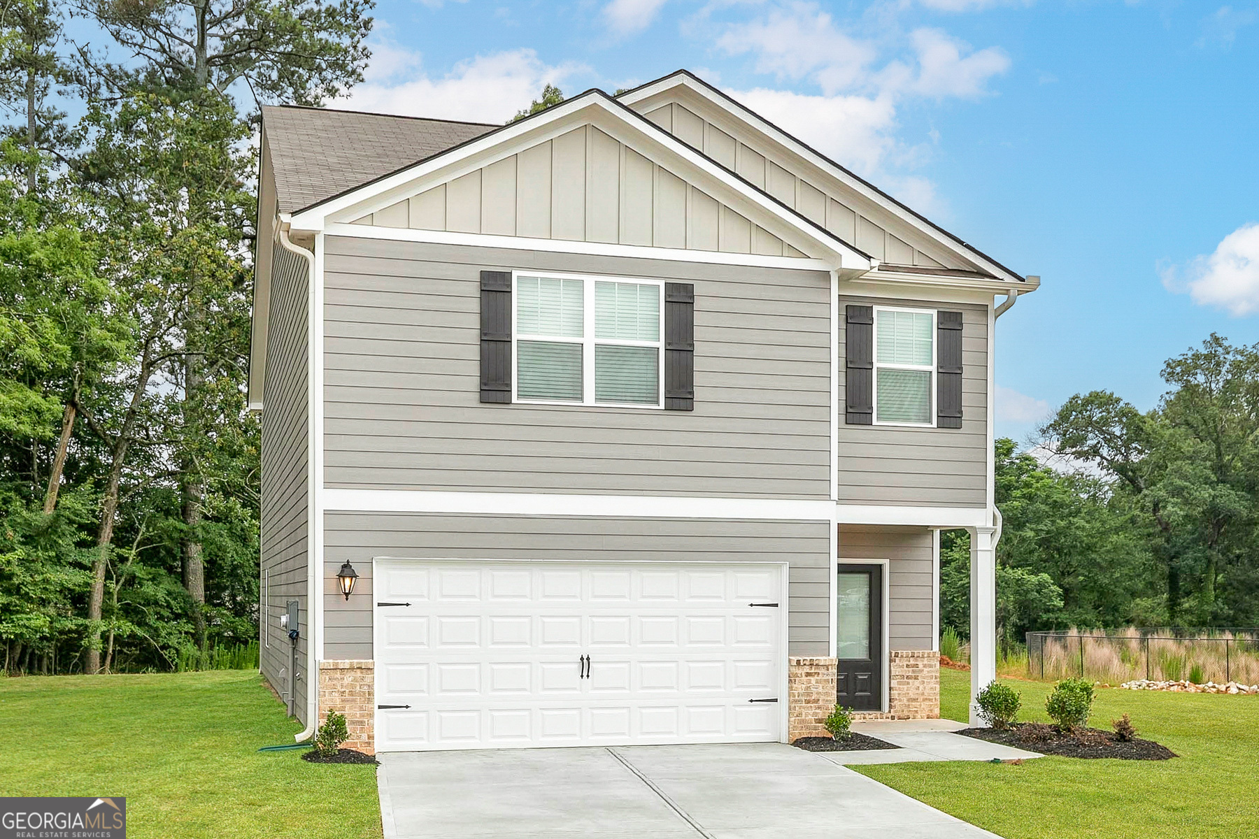 514 Plant Road Conyers, GA 30013 - Photo 2 of 18 a view of a house with a yard