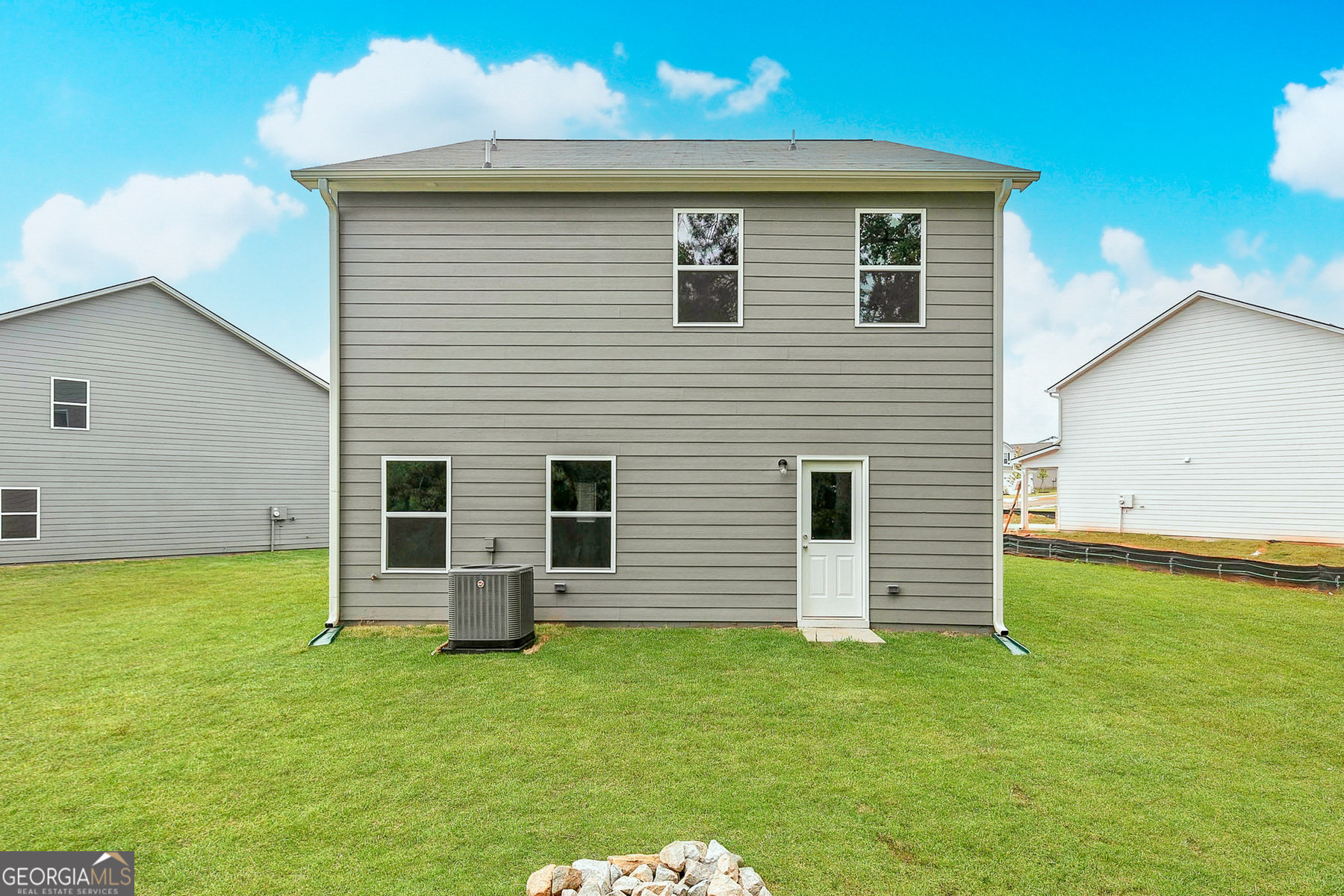 514 Plant Road Conyers, GA 30013 - Photo 3 of 18 a view of a backyard of the house