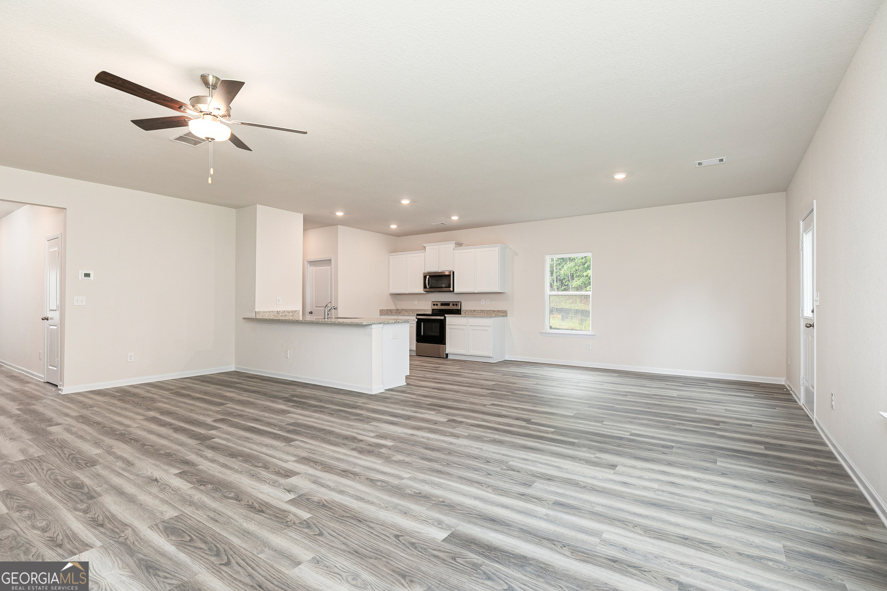 514 Plant Road Conyers, GA 30013 - Photo 4 of 18 a view of kitchen with sink and refrigerator
