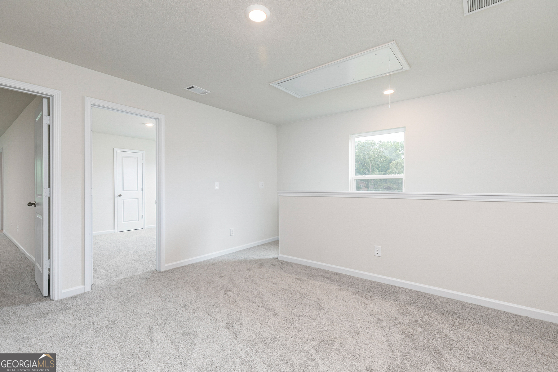 514 Plant Road Conyers, GA 30013 - Photo 9 of 18 an empty room with a window