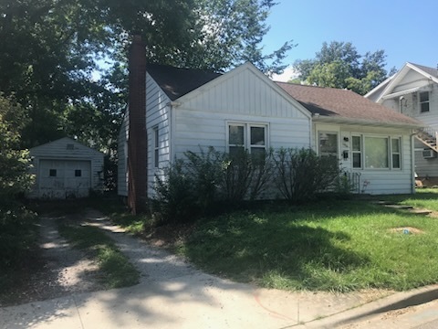 106 South Springer Street Carbondale, IL 62901 - Photo 2 of 20 a view of a house with backyard and garden