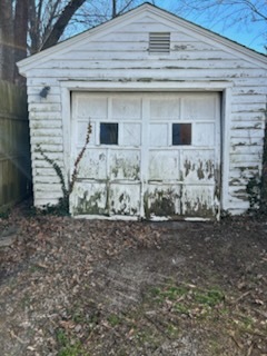 106 South Springer Street Carbondale, IL 62901 - Photo 6 of 20 a front view of a house with garage
