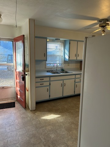 106 South Springer Street Carbondale, IL 62901 - Photo 7 of 20 a bathroom with a double vanity sink a mirror and a bathtub
