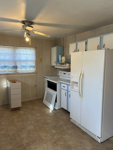 106 South Springer Street Carbondale, IL 62901 - Photo 8 of 20 a kitchen with refrigerator and cabinets