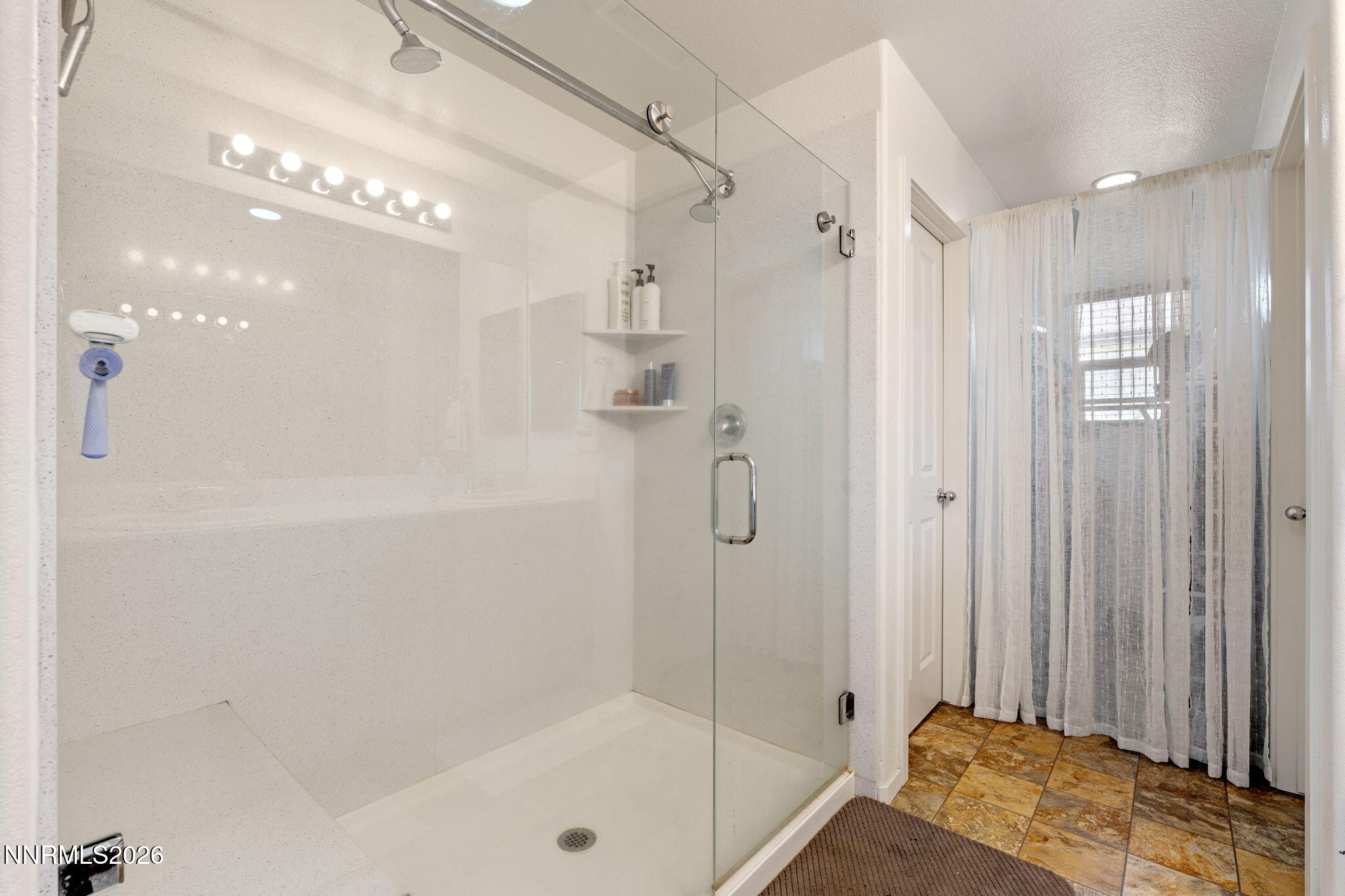 14397 Fredonia Drive Reno, NV 89506 - Photo 28 of 33 Primary Bathroom Shower