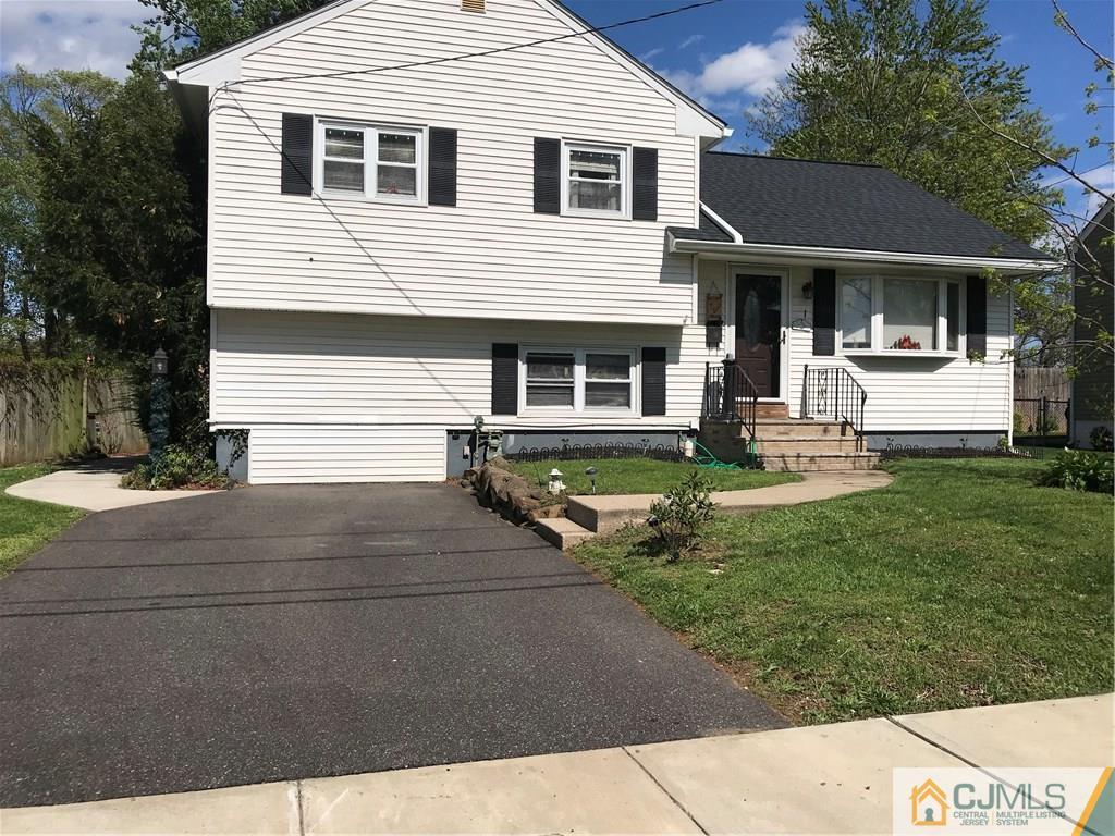 1 Wilshire Road Edison, NJ 08817 - Photo 1 of 3 a view of house and outdoor space with yard