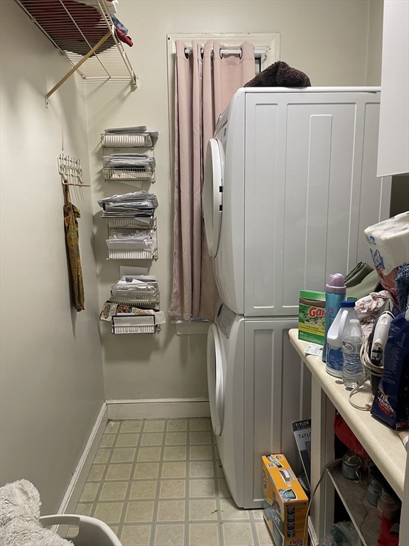 53 Mt Ida Road, Unit 1 Boston, MA 02122 - Photo 10 of 10 a view of storage and utility room with racks on the wall