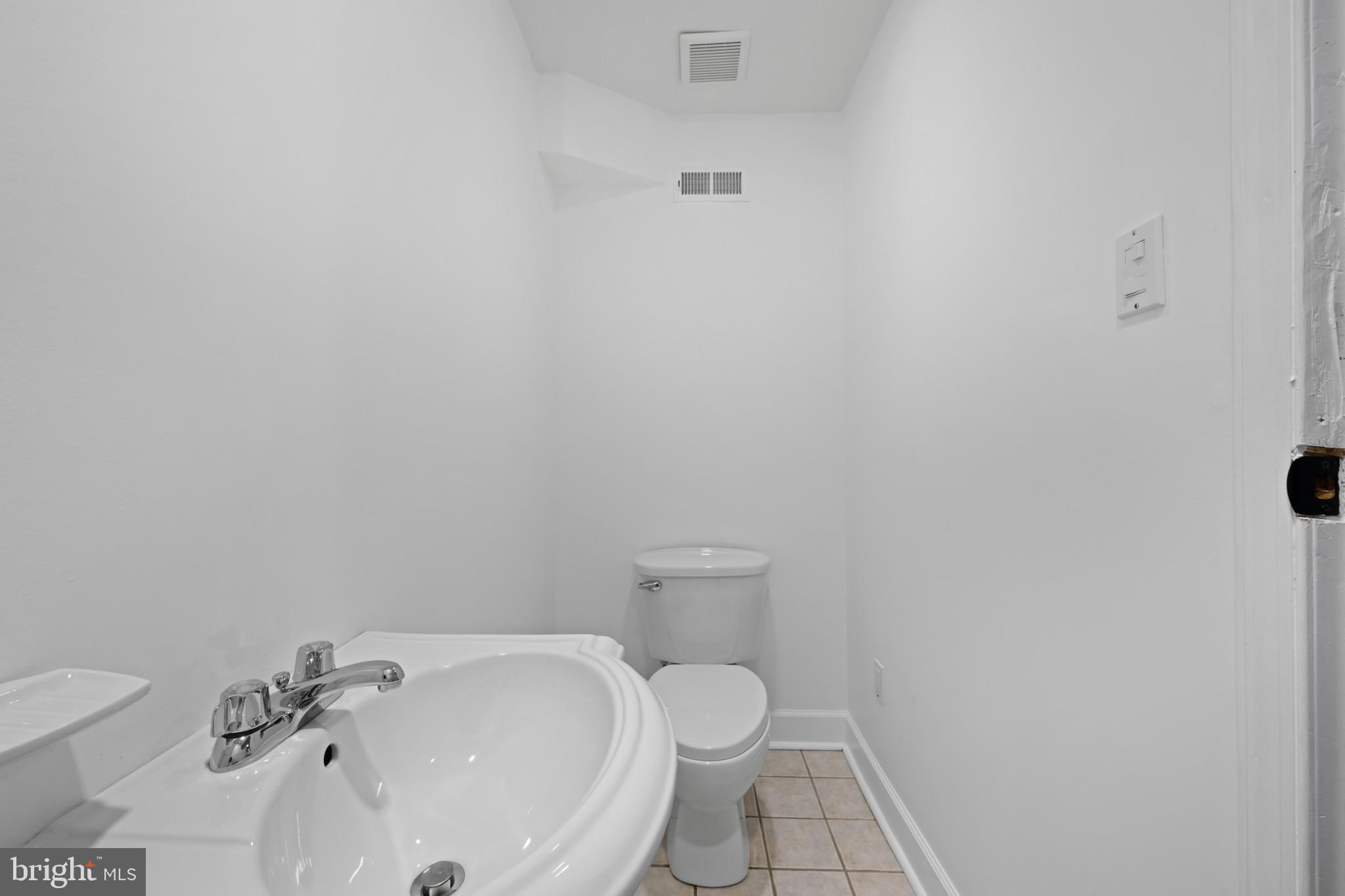 13054 Tarragon Road Reisterstown, MD 21136 - Photo 53 of 68 Half bathroom