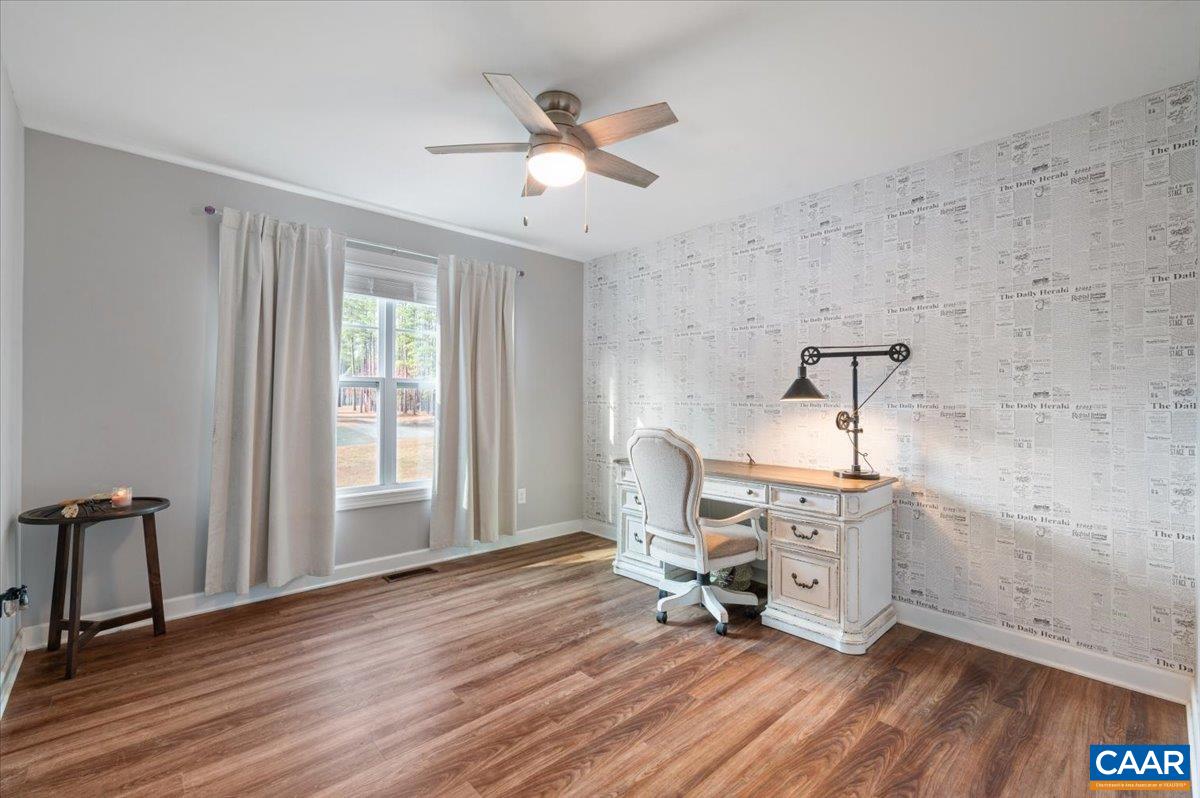 481 Country Creek Way Palmyra, VA 22963 - Photo 23 of 66 a living room with furniture and a wooden floor