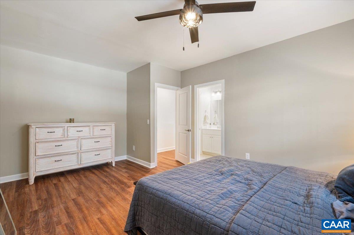 481 Country Creek Way Palmyra, VA 22963 - Photo 32 of 66 a bedroom with a bed and furniture