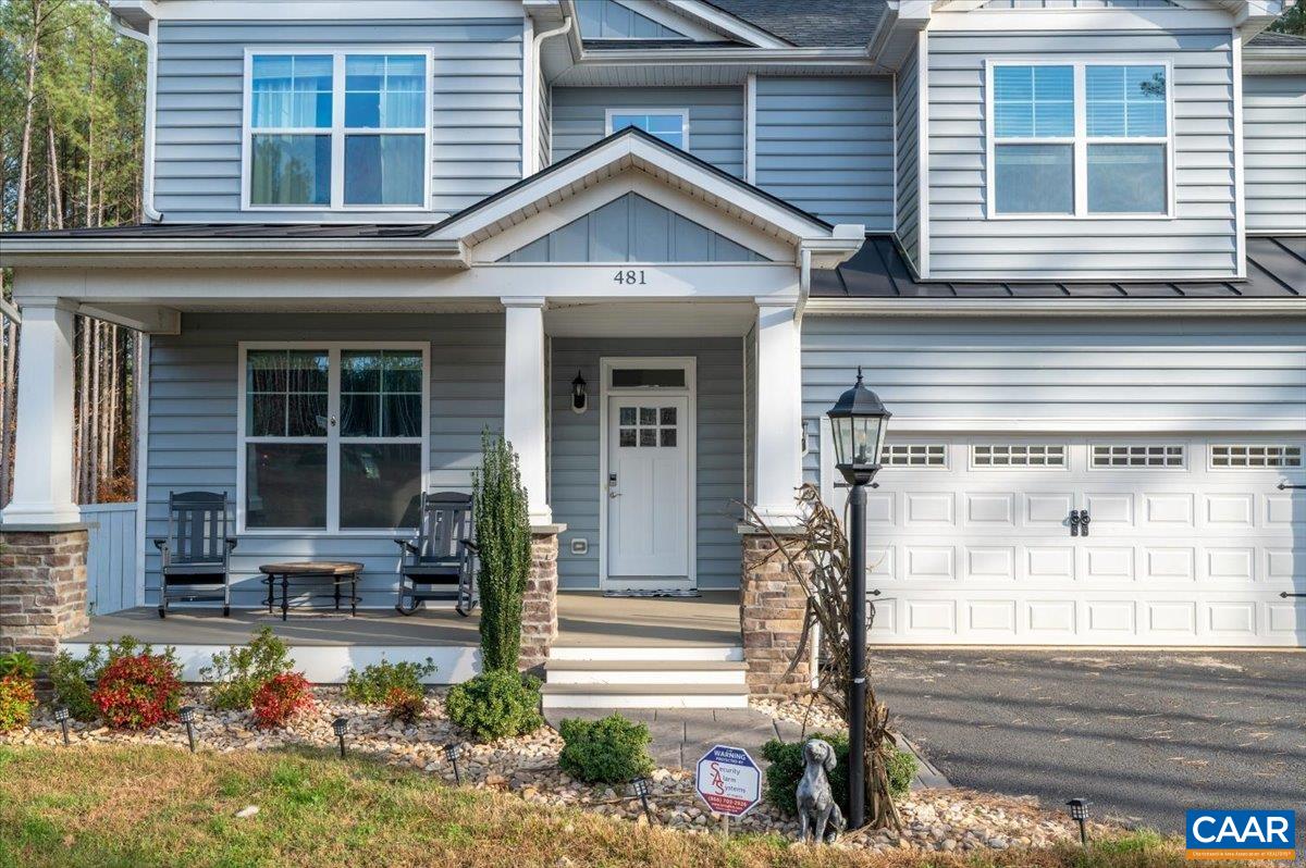 481 Country Creek Way Palmyra, VA 22963 - Photo 37 of 66 a front view of a house with a yard