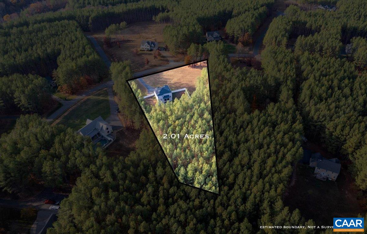 481 Country Creek Way Palmyra, VA 22963 - Photo 49 of 66 a view of a back yard of a house