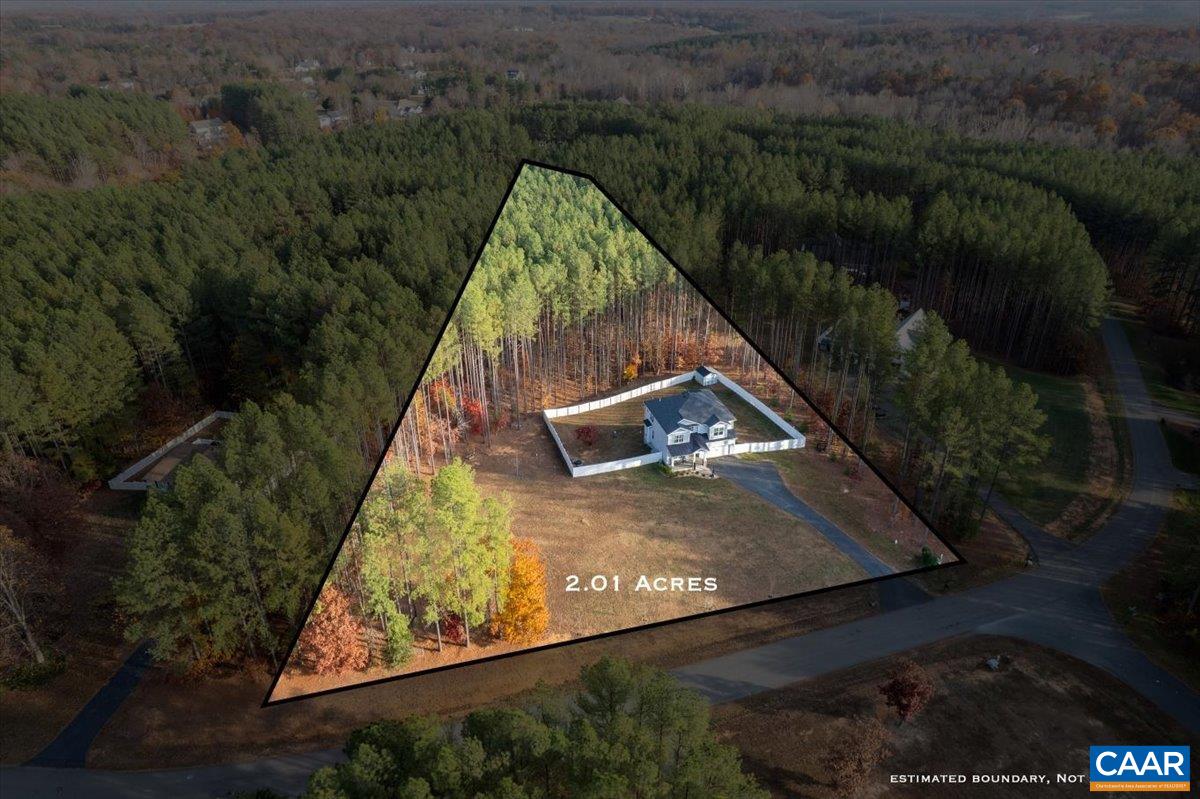 481 Country Creek Way Palmyra, VA 22963 - Photo 53 of 66 an aerial view of a house with swimming pool