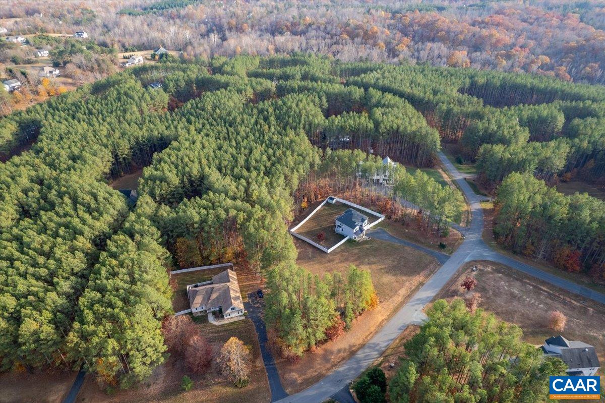 481 Country Creek Way Palmyra, VA 22963 - Photo 62 of 66 an aerial view of a house with a yard