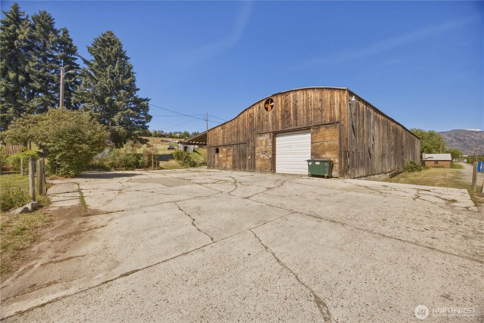 1281 Totem Pole Road Manson, WA 98831 - Photo 30 of 39 a view of large house with a yard