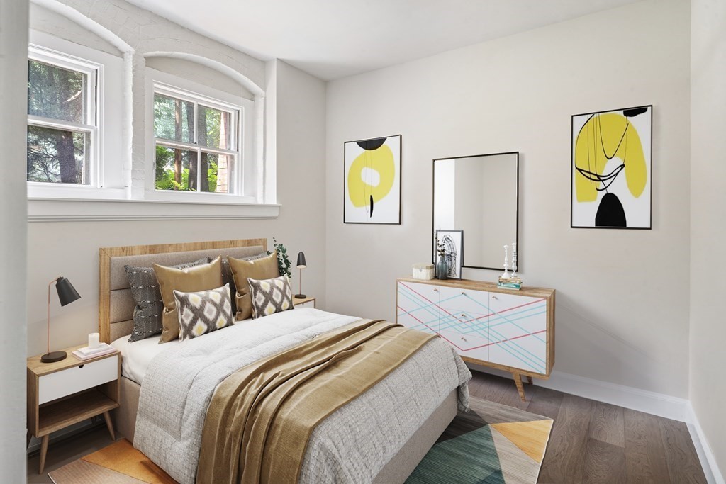1000 Centre Street, Unit 3 Boston, MA 02130 - Photo 11 of 14 a bedroom with a bed and a window
