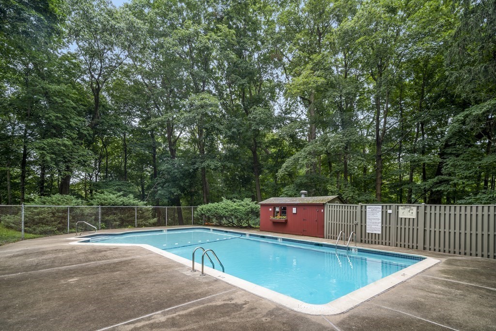 1000 Centre Street, Unit 3 Boston, MA 02130 - Photo 14 of 14 a view of a swimming pool with a patio and yard