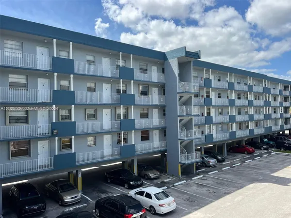 a front view of a building with balcony