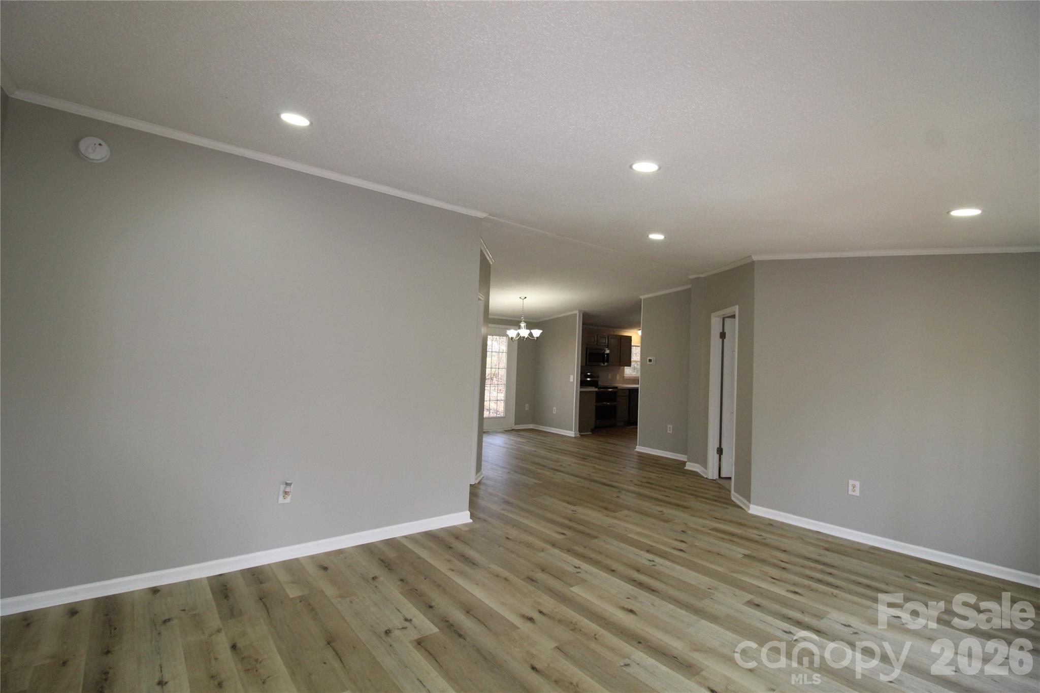 410 Johnstone Road Cleveland, NC 27013 - Photo 15 of 43 a view of a room with wooden floor