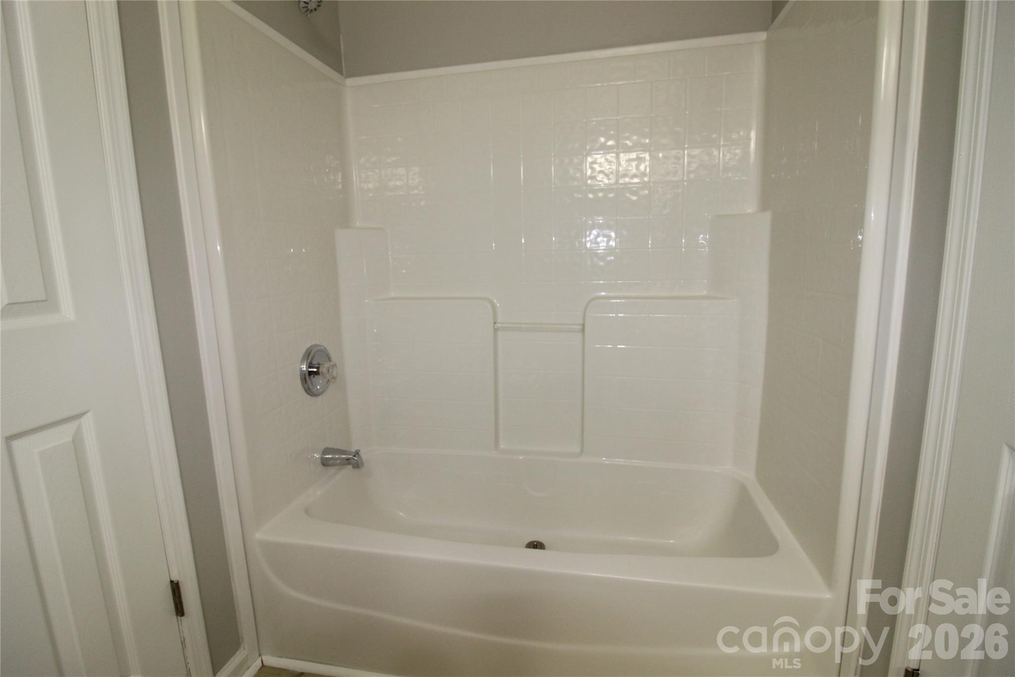 410 Johnstone Road Cleveland, NC 27013 - Photo 18 of 43 a bathroom with a bathtub