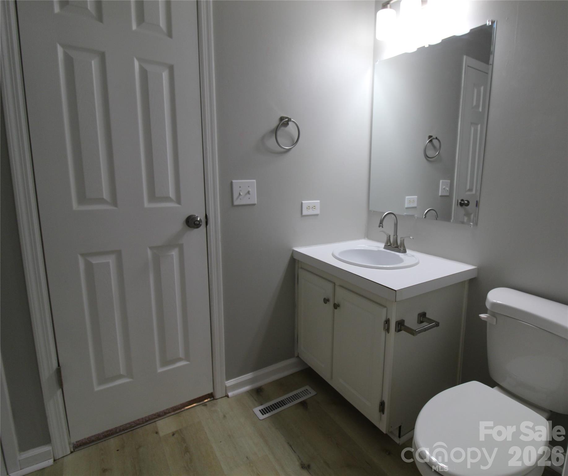 410 Johnstone Road Cleveland, NC 27013 - Photo 26 of 43 a bathroom with a sink a toilet and shower