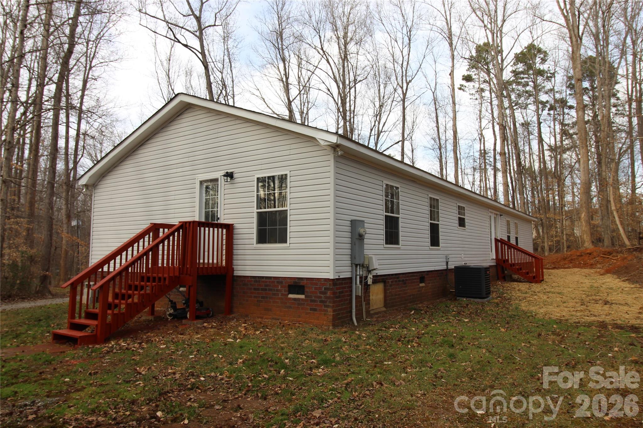 410 Johnstone Road Cleveland, NC 27013 - Photo 32 of 43 a view of a house with a yard