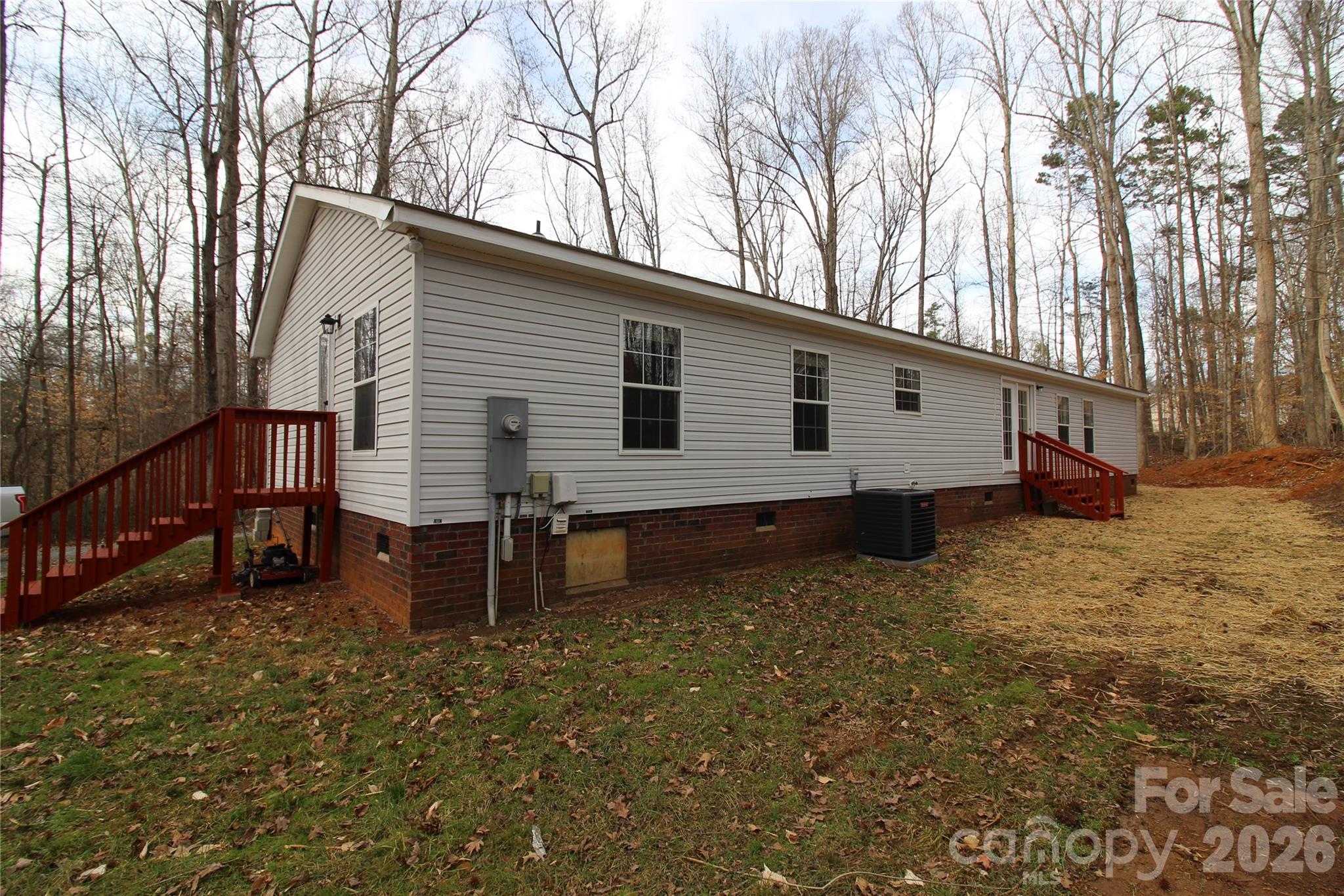 410 Johnstone Road Cleveland, NC 27013 - Photo 33 of 43 a view of a house with a yard