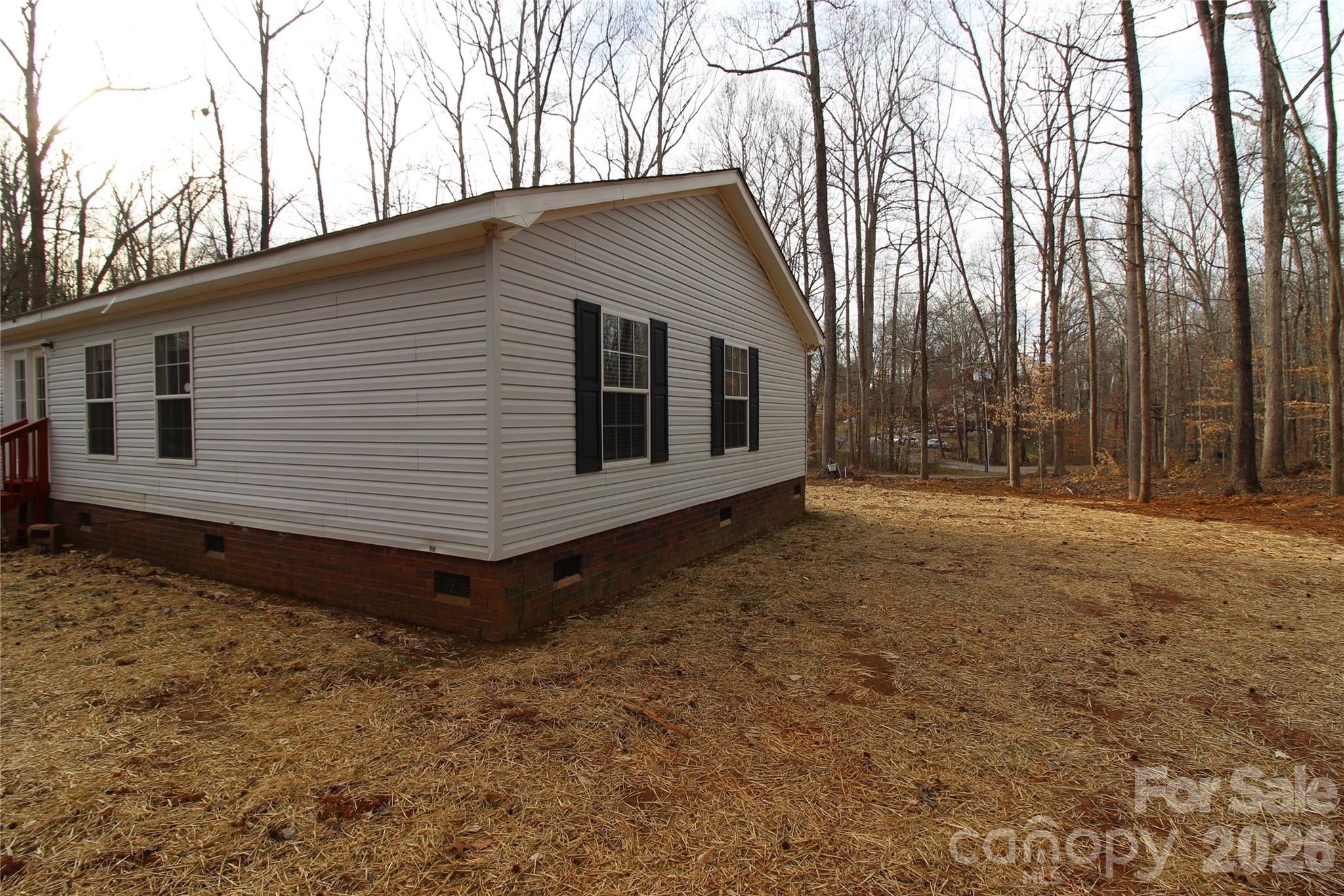 410 Johnstone Road Cleveland, NC 27013 - Photo 35 of 43 a front view of a house with a yard