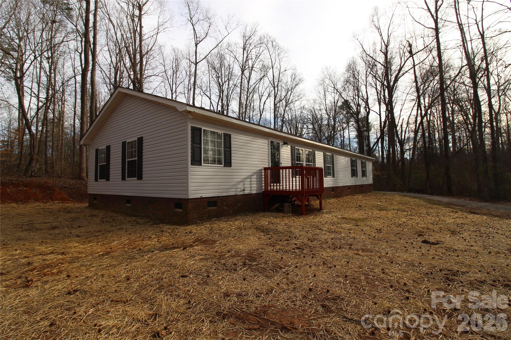 410 Johnstone Road Cleveland, NC 27013 - Photo 39 of 43 a view of a house with a yard