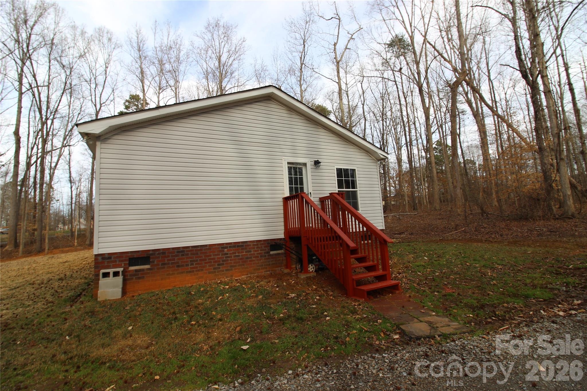 410 Johnstone Road Cleveland, NC 27013 - Photo 43 of 43 front view of a house with a yard