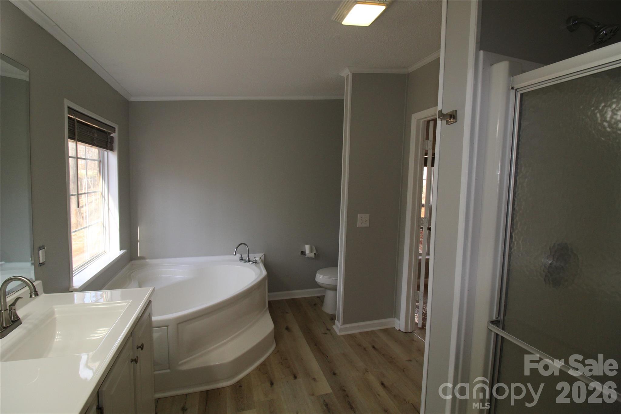 410 Johnstone Road Cleveland, NC 27013 - Photo 5 of 43 a bathroom with a tub and sink