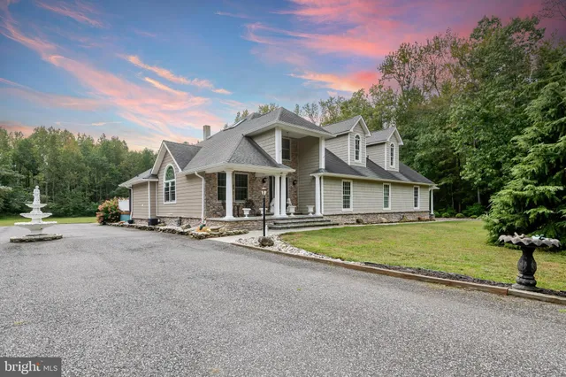 a view of a house with a outdoor space and street view