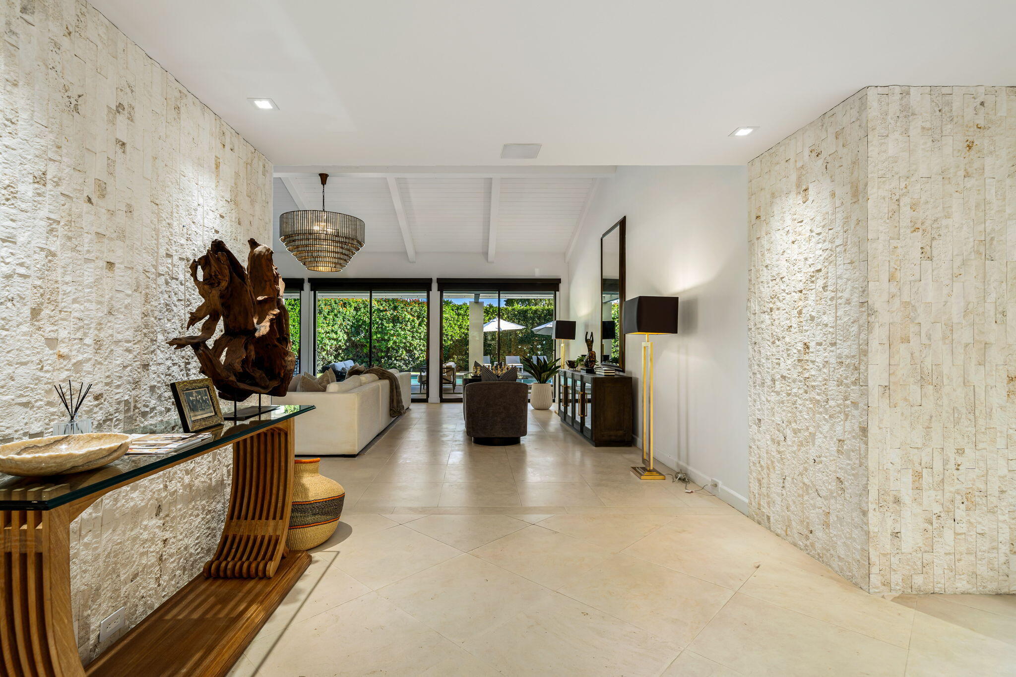 6 Exeter Court Rancho Mirage, CA 92270 - Photo 10 of 54 a lobby with furniture and a floor to ceiling window