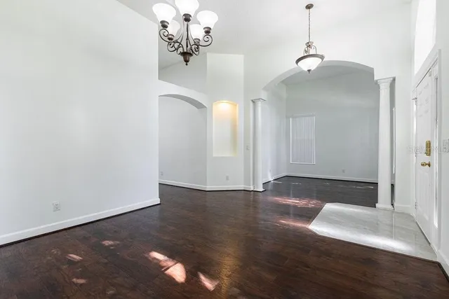 a view of a livingroom with wooden floor