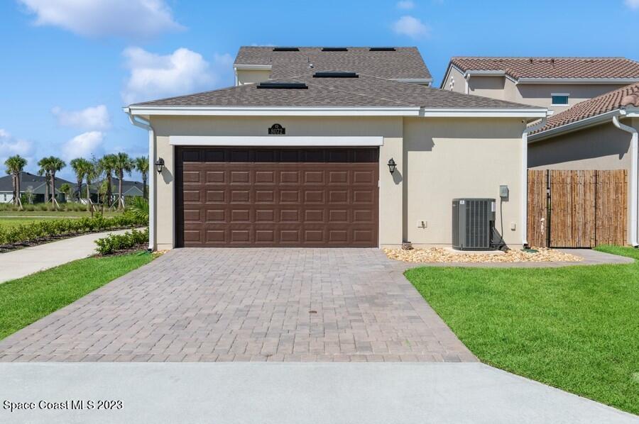 8072 Rungsted Lane Melbourne, FL 32940 - Photo 5 of 59 front view of a house with a yard