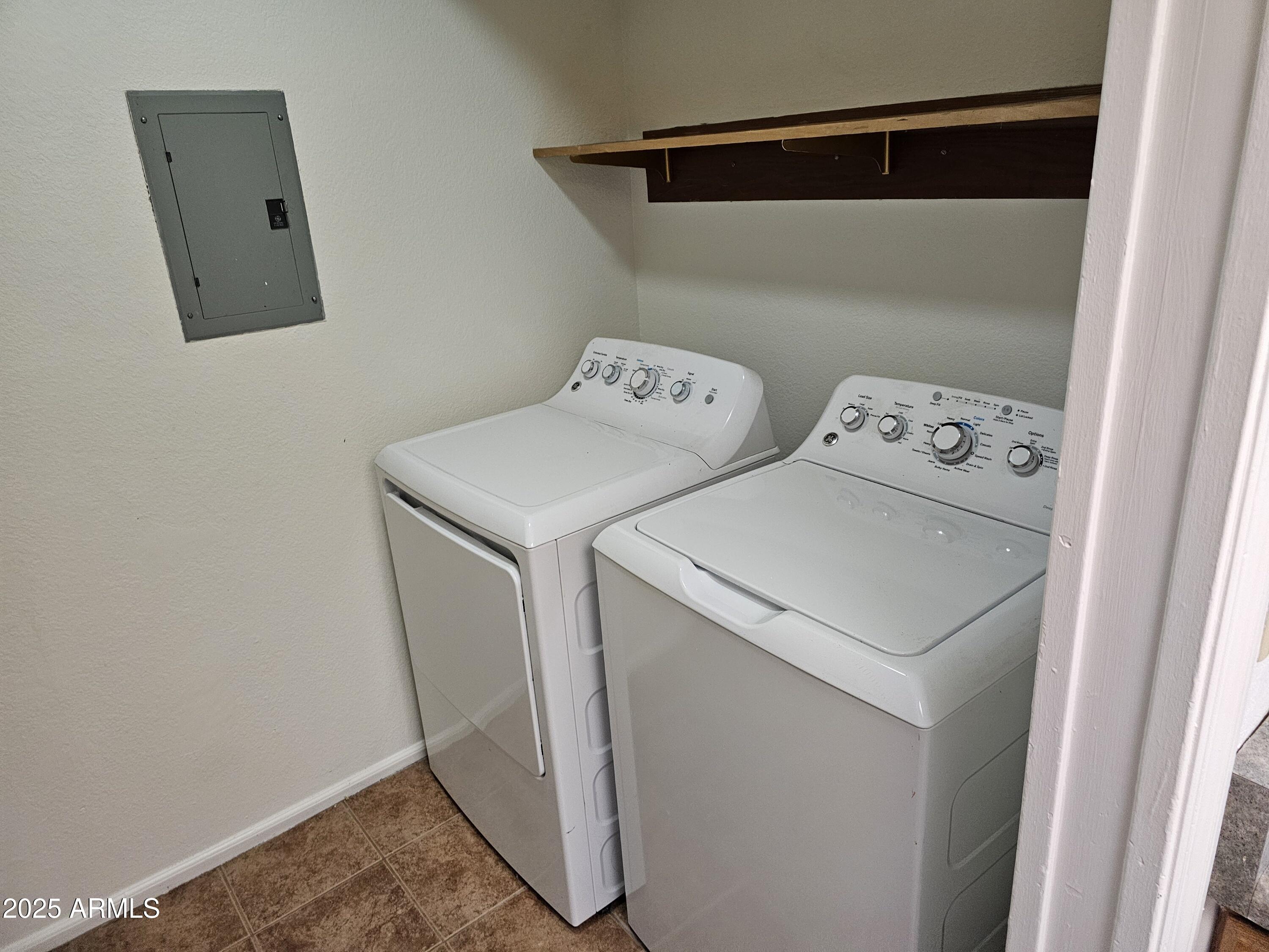 633 West Southern Avenue, Unit 1118 Tempe, AZ 85282 - Photo 10 of 12 a utility room with dryer and washer